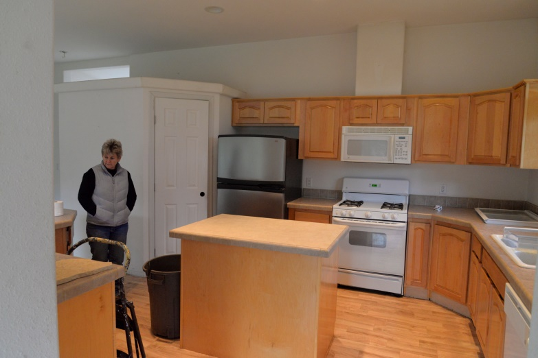 The original kitchen before the renovation, including the enclosed pantry that took up valuable floor space