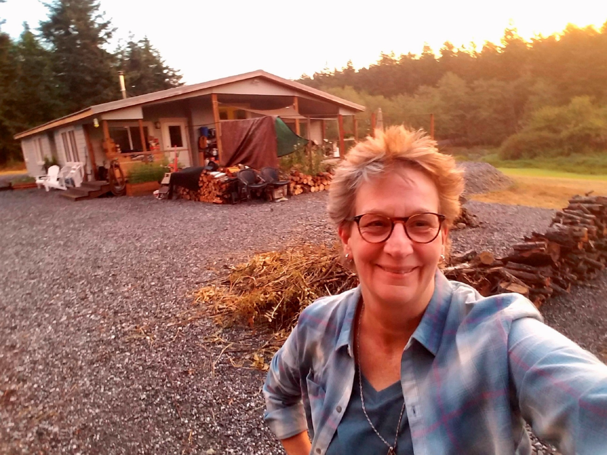 Cheryl smiling on site at the beginning of her home remodel